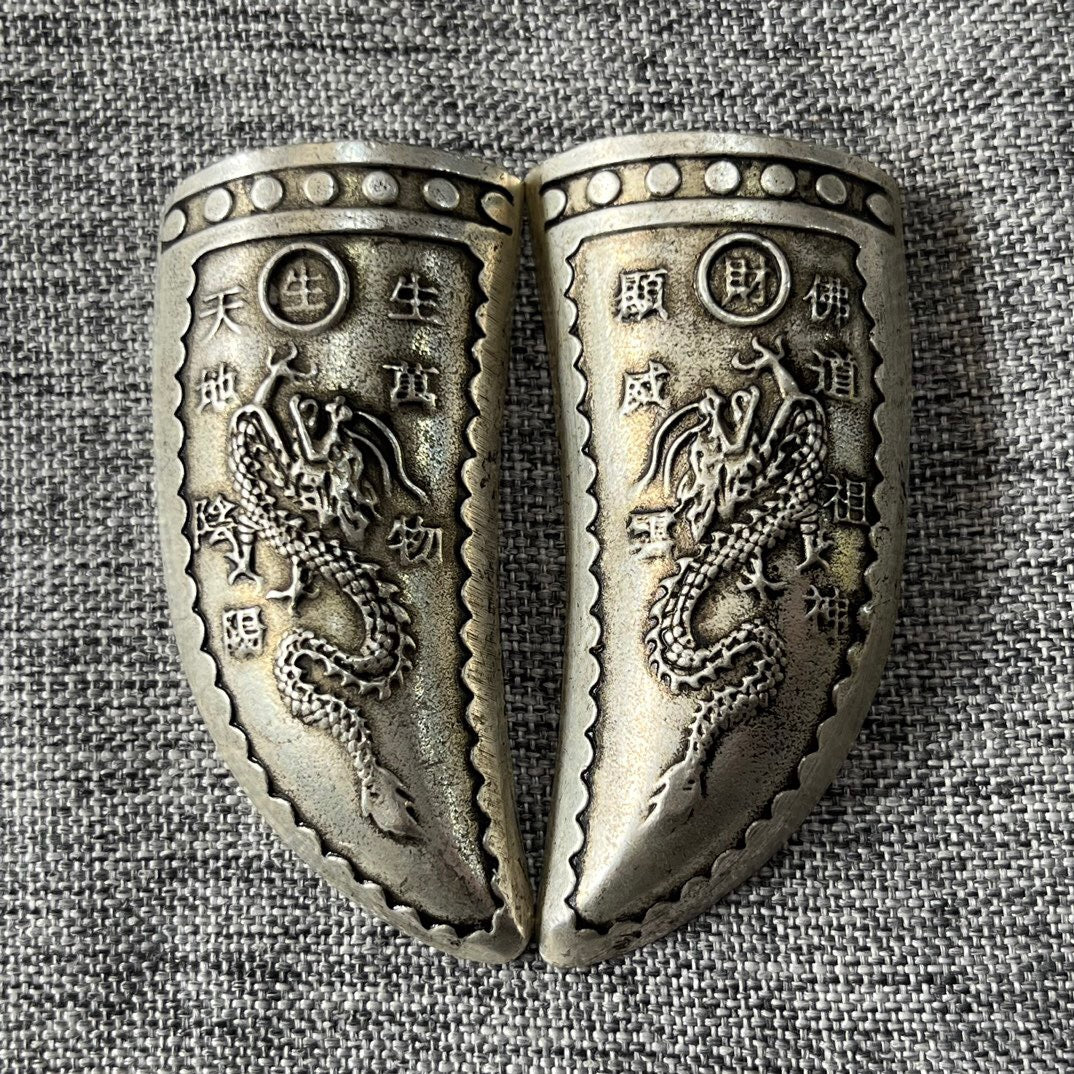 A pair of Chinese antique alloy copper wealth generating gossip