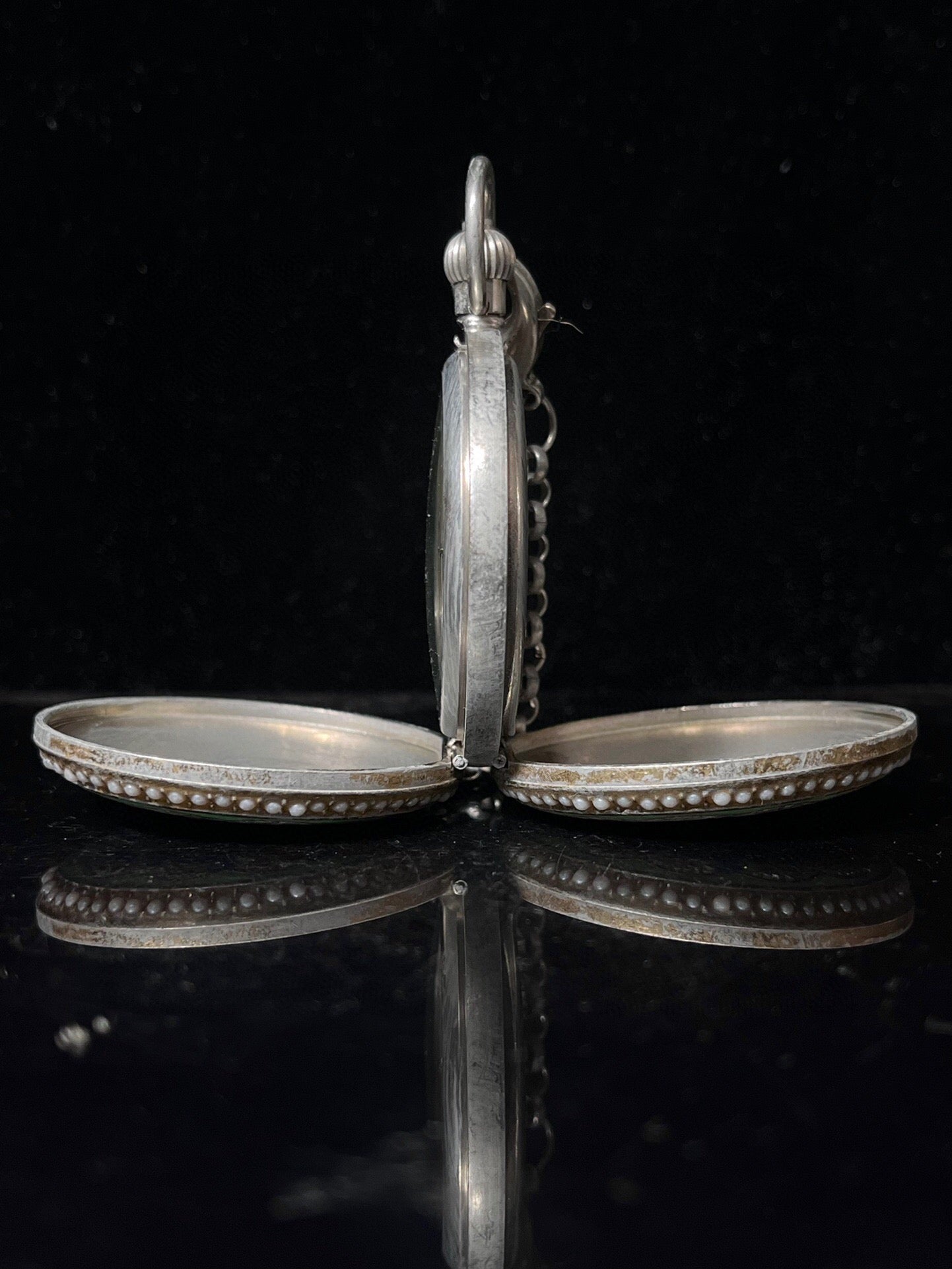 Chinese antique double opening pocket watch with sun, moon, and stars