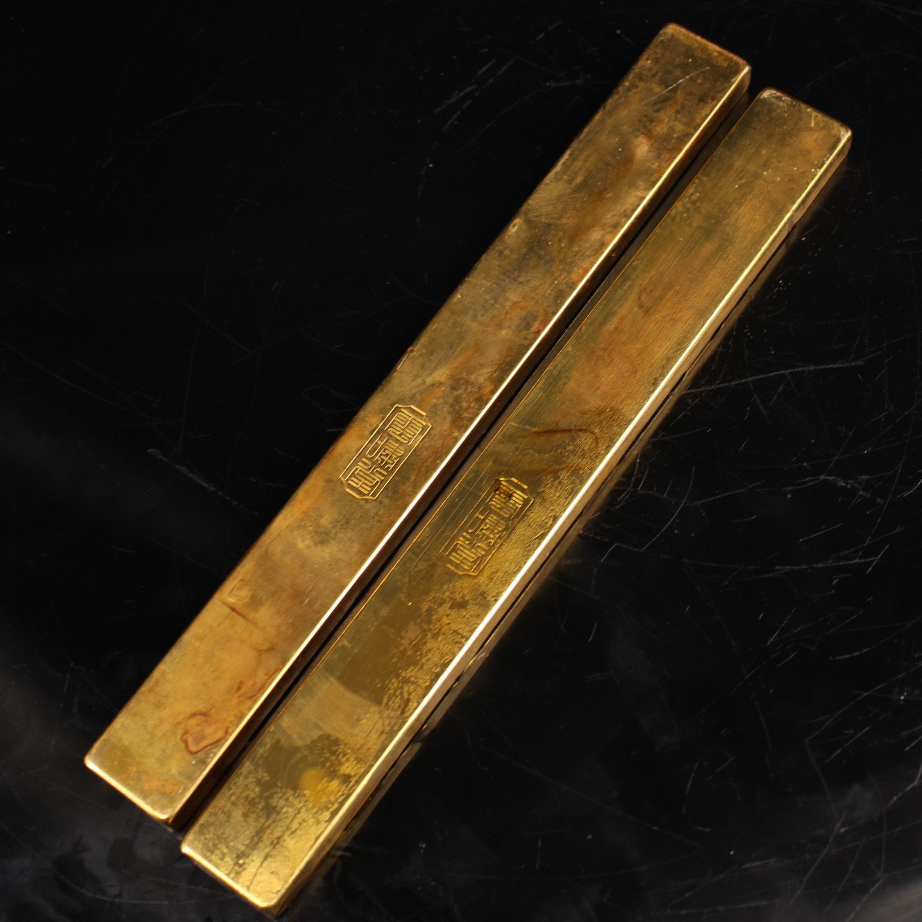 A pair of handmade pure copper gilded town rulers crafted from Chinese antiques