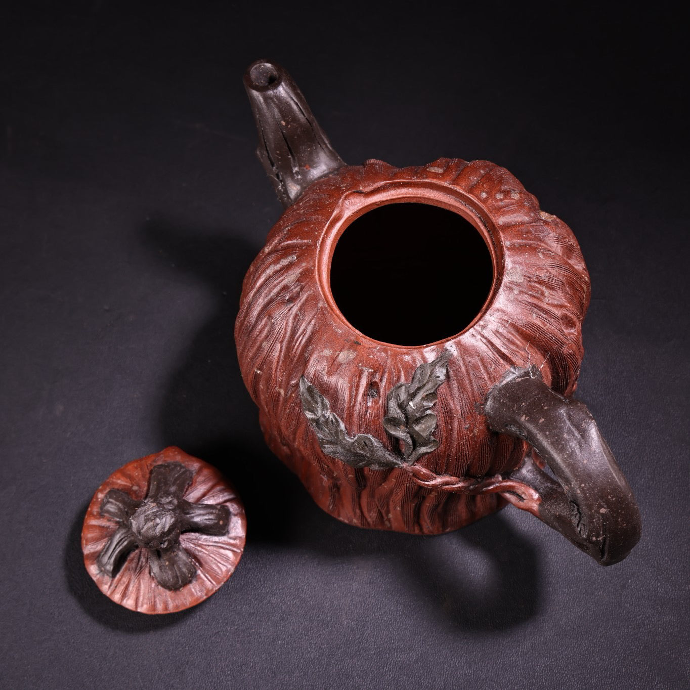 A red clay and purple clay teapot