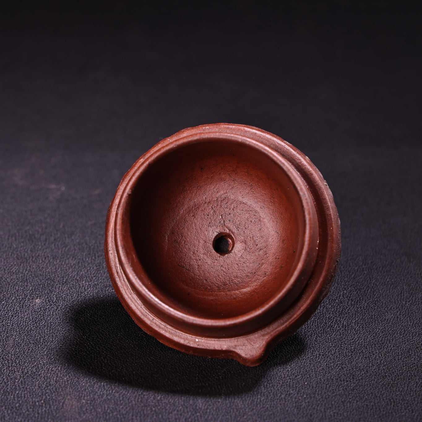 A red clay and purple clay teapot