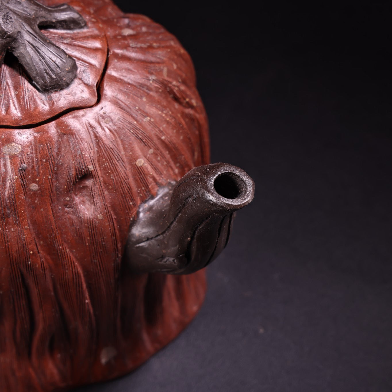 A red clay and purple clay teapot