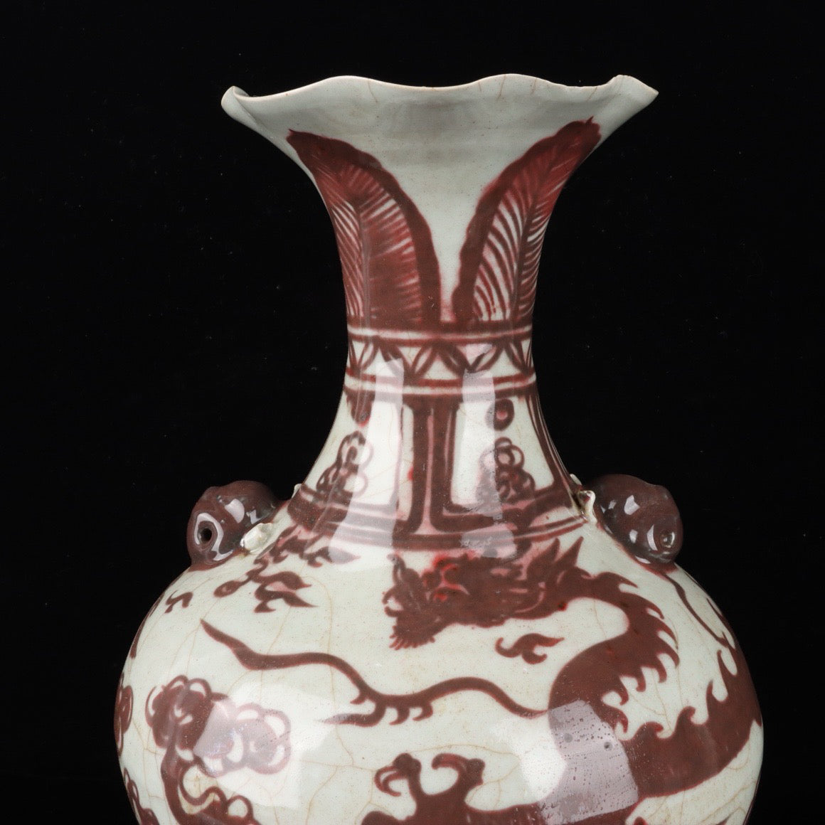 A pair of cloud dragon patterned beast ear bottles