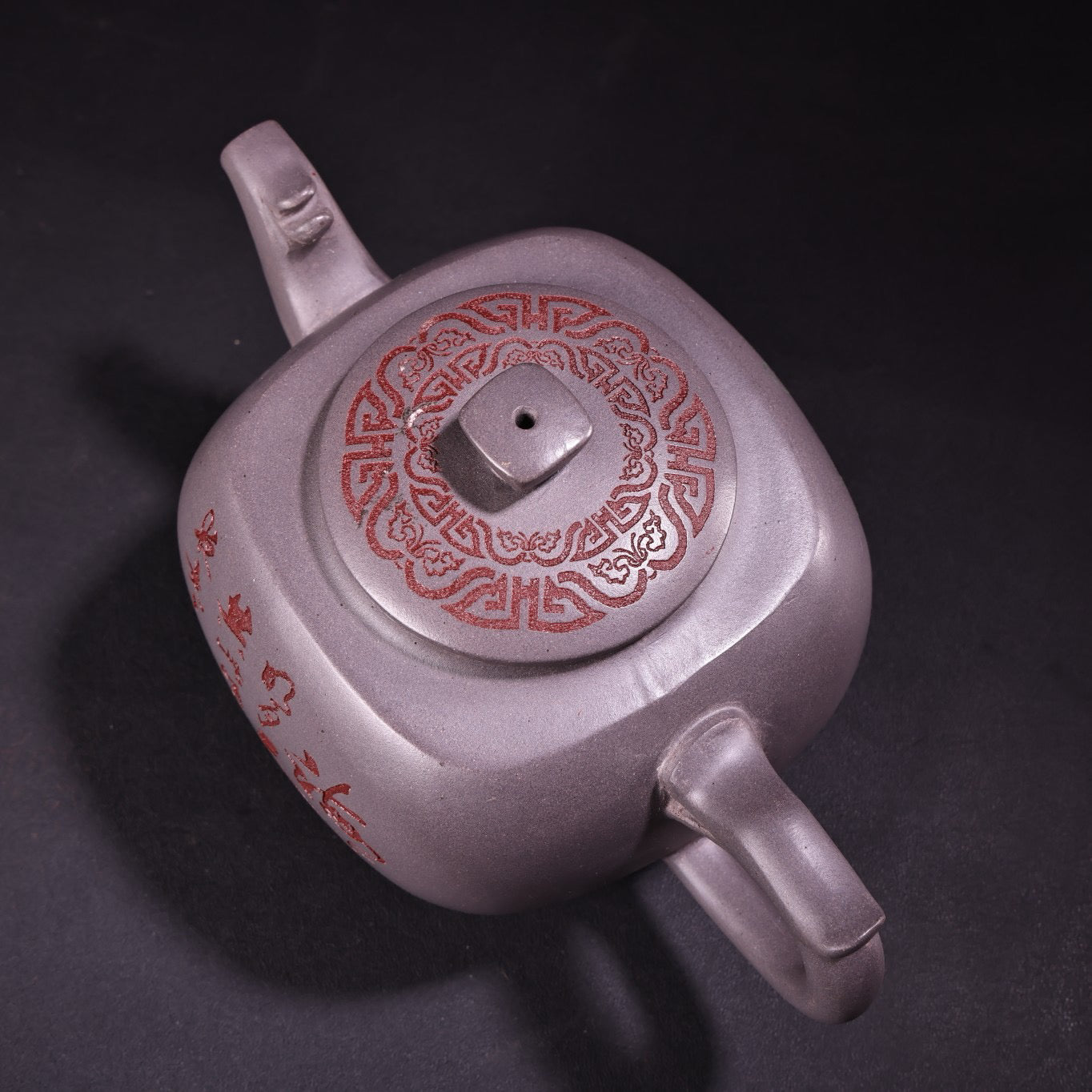 A handmade sky blue purple clay teapot