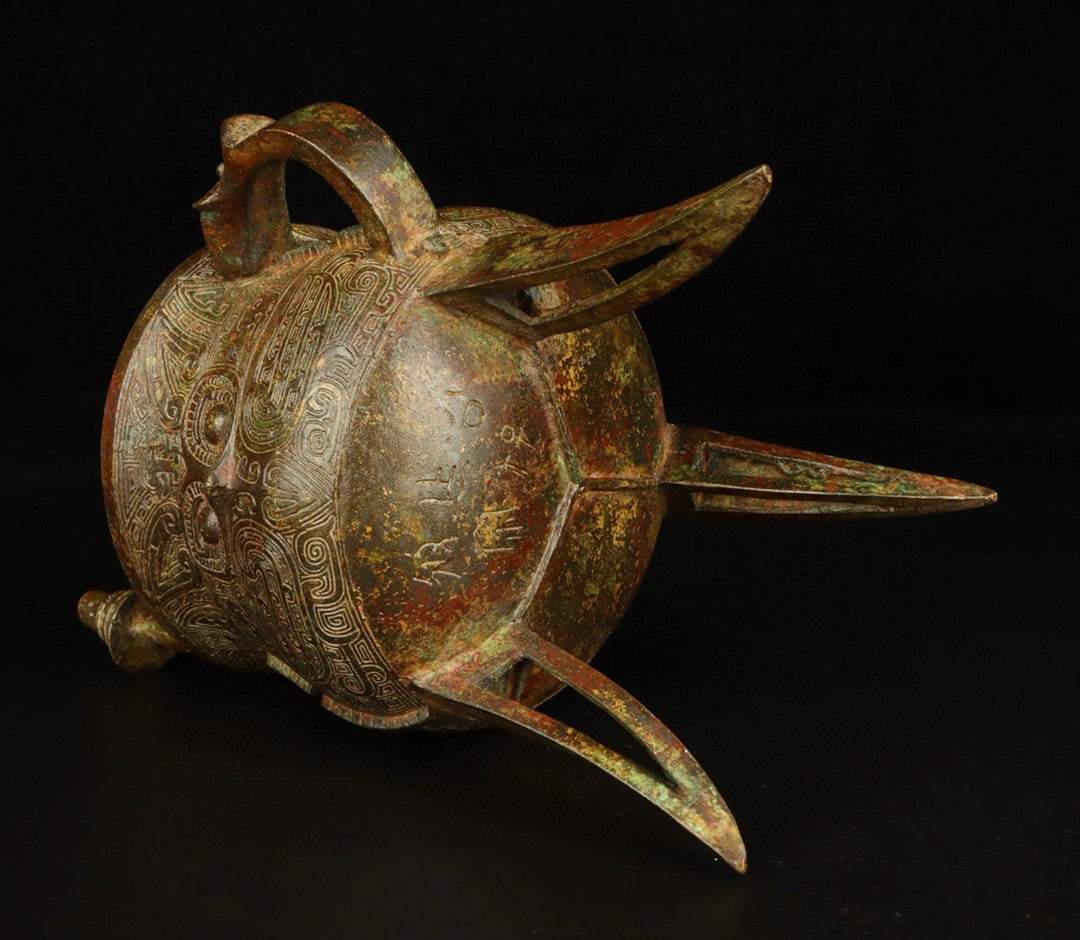 Chinese antique bronze eagle faced vessel