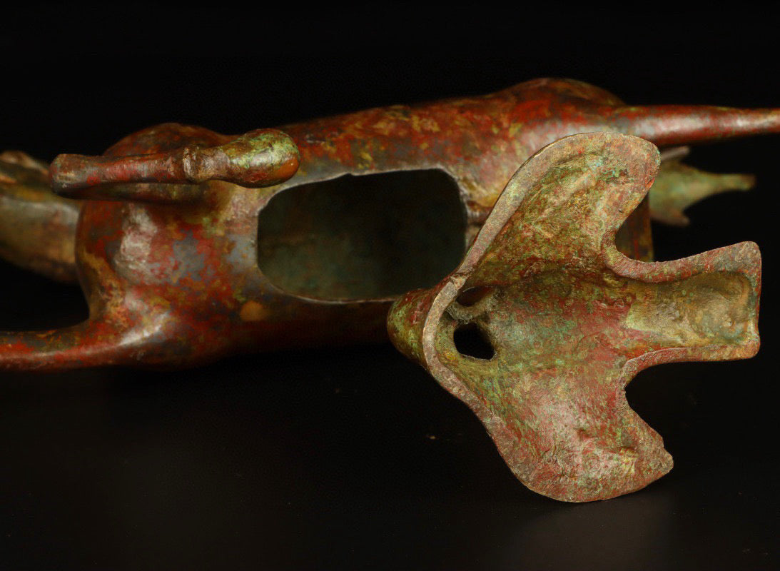 Chinese antique bronze horse steps on a flying swallow