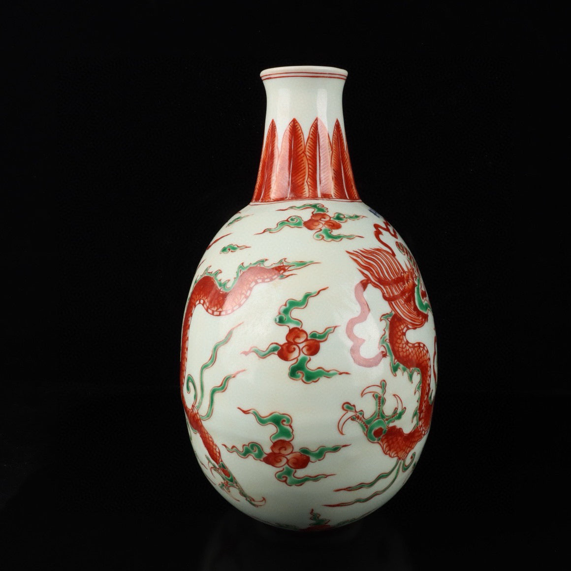Red and green colored cloud dragon patterned flat bottle