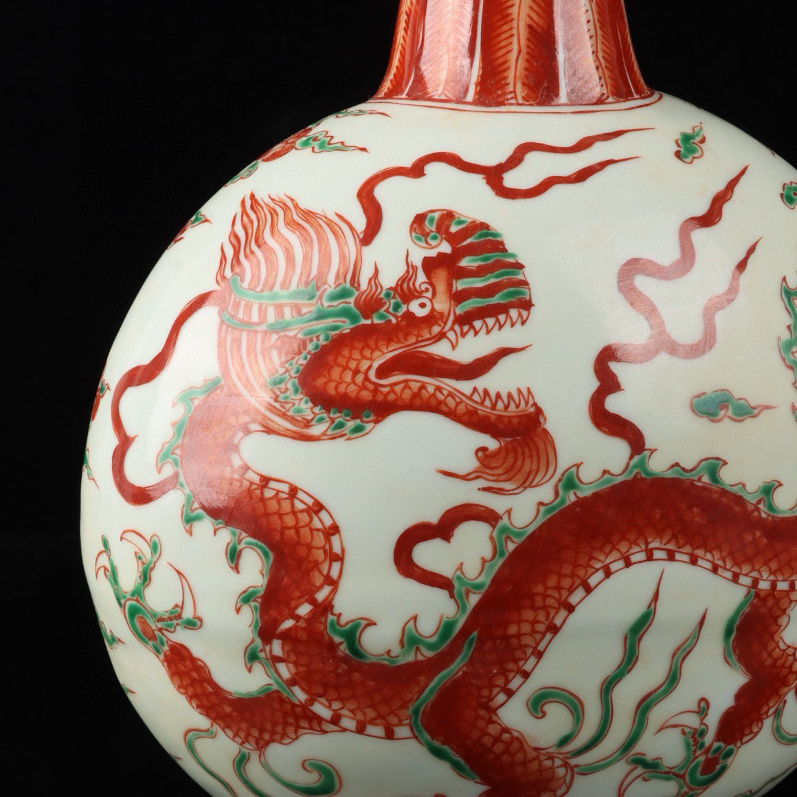 Red and green colored cloud dragon patterned flat bottle