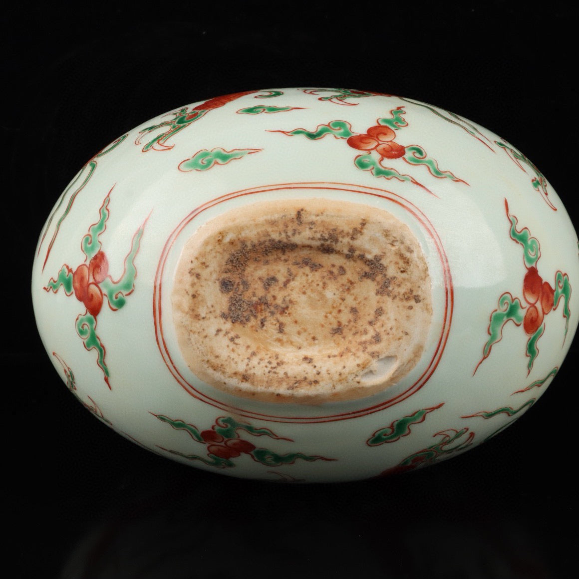 Red and green colored cloud dragon patterned flat bottle