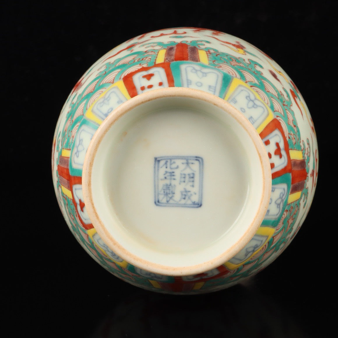 A pair of colorful Pegasus patterned bottles