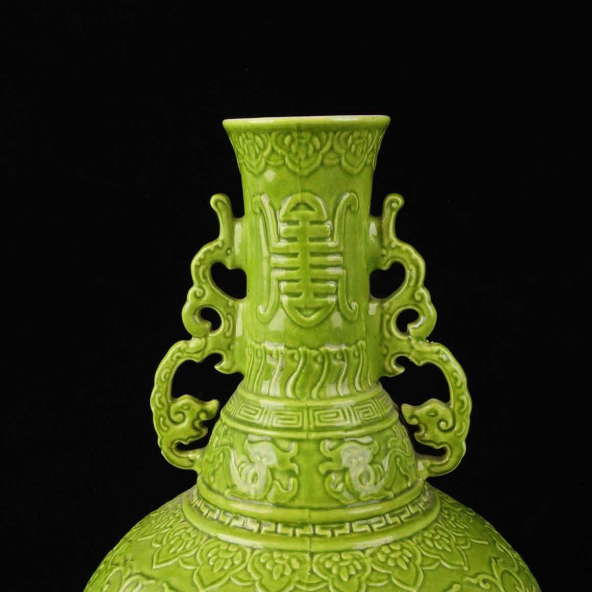 A pair of monochrome glazed relief cloud dragon patterned double ear bottles