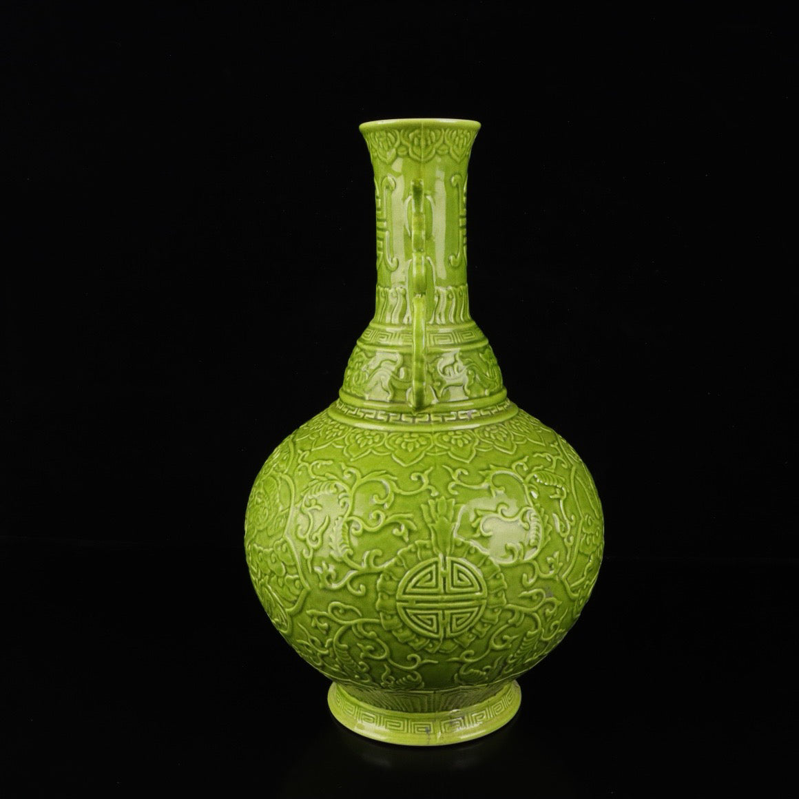 A pair of monochrome glazed relief cloud dragon patterned double ear bottles