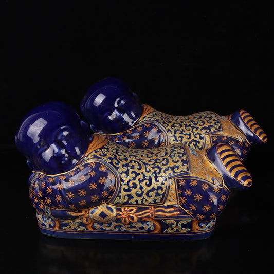 A pair of colorful golden flower patterned children's pillows