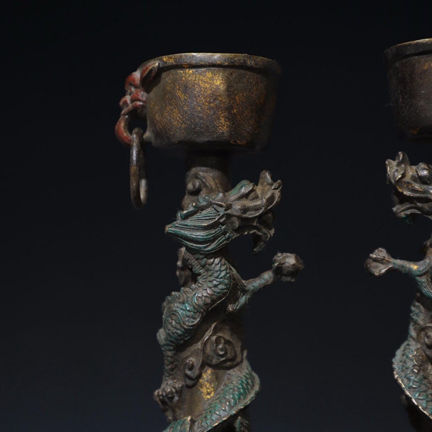 A pair of pure copper double dragon candle holders