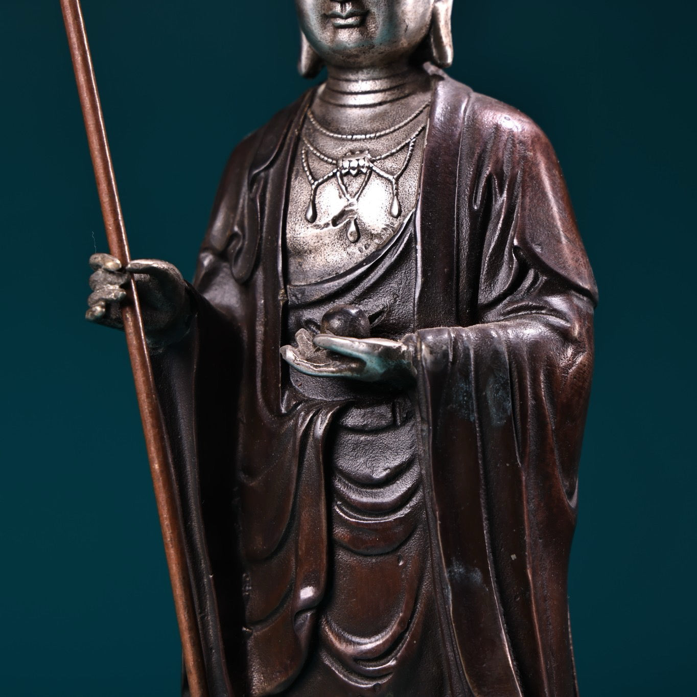 A pure copper high relief carved and gilded silver statue of the Ksitigarbha Bodhisattva