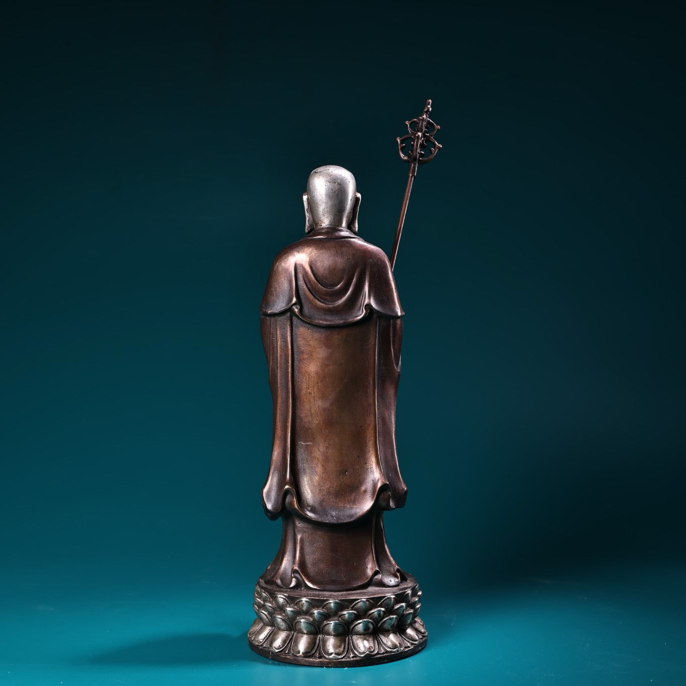 A pure copper high relief carved and gilded silver statue of the Ksitigarbha Bodhisattva