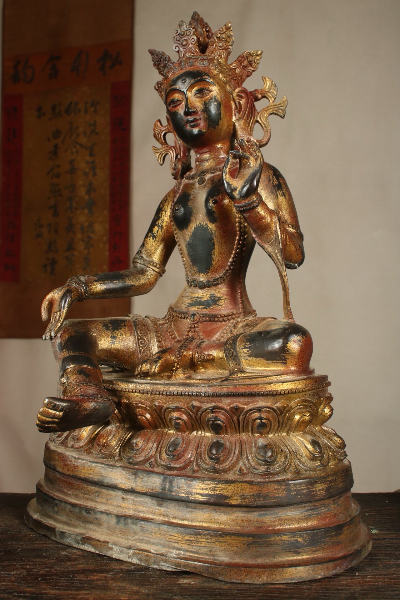 A Chinese antique bronze gilded handmade green tara statue