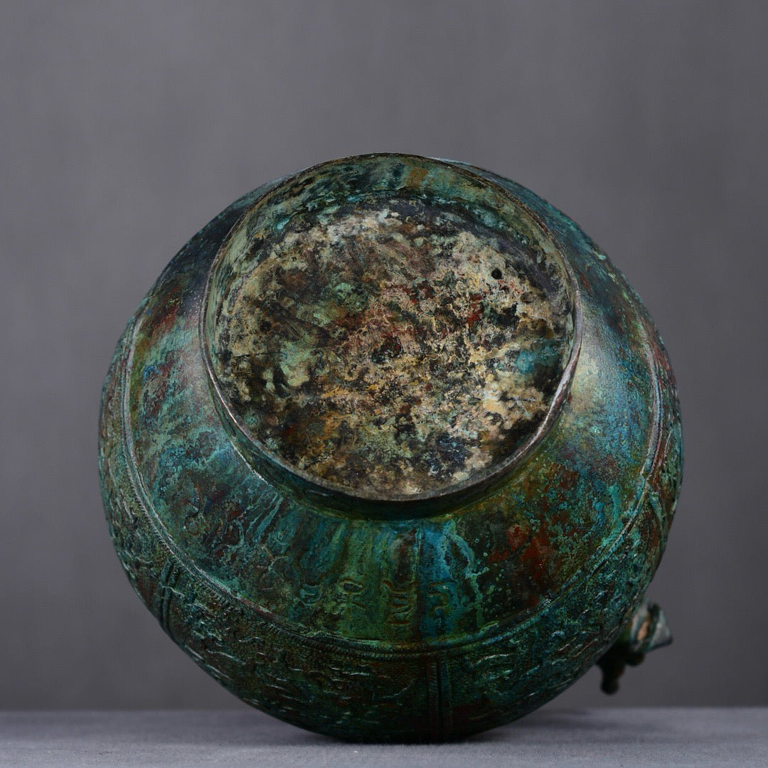 Chinese antique bronze hunting patterned teapot