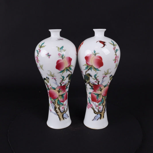 A pair of pink peaches offering longevity picture plum bottles