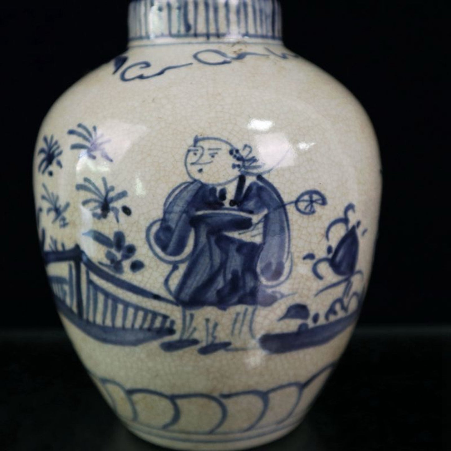 Open blue and white figure patterned jar