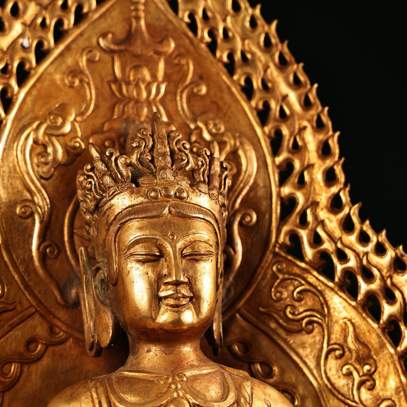 A Chinese antique pure copper high relief carved with gilded immeasurable longevity Buddha