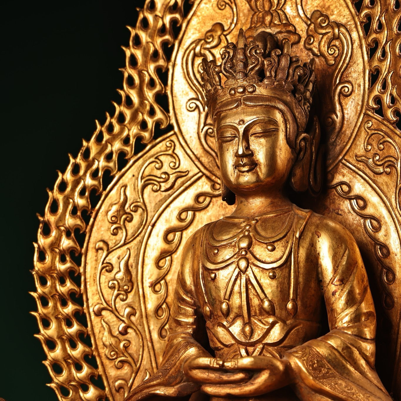 A Chinese antique pure copper high relief carved with gilded immeasurable longevity Buddha