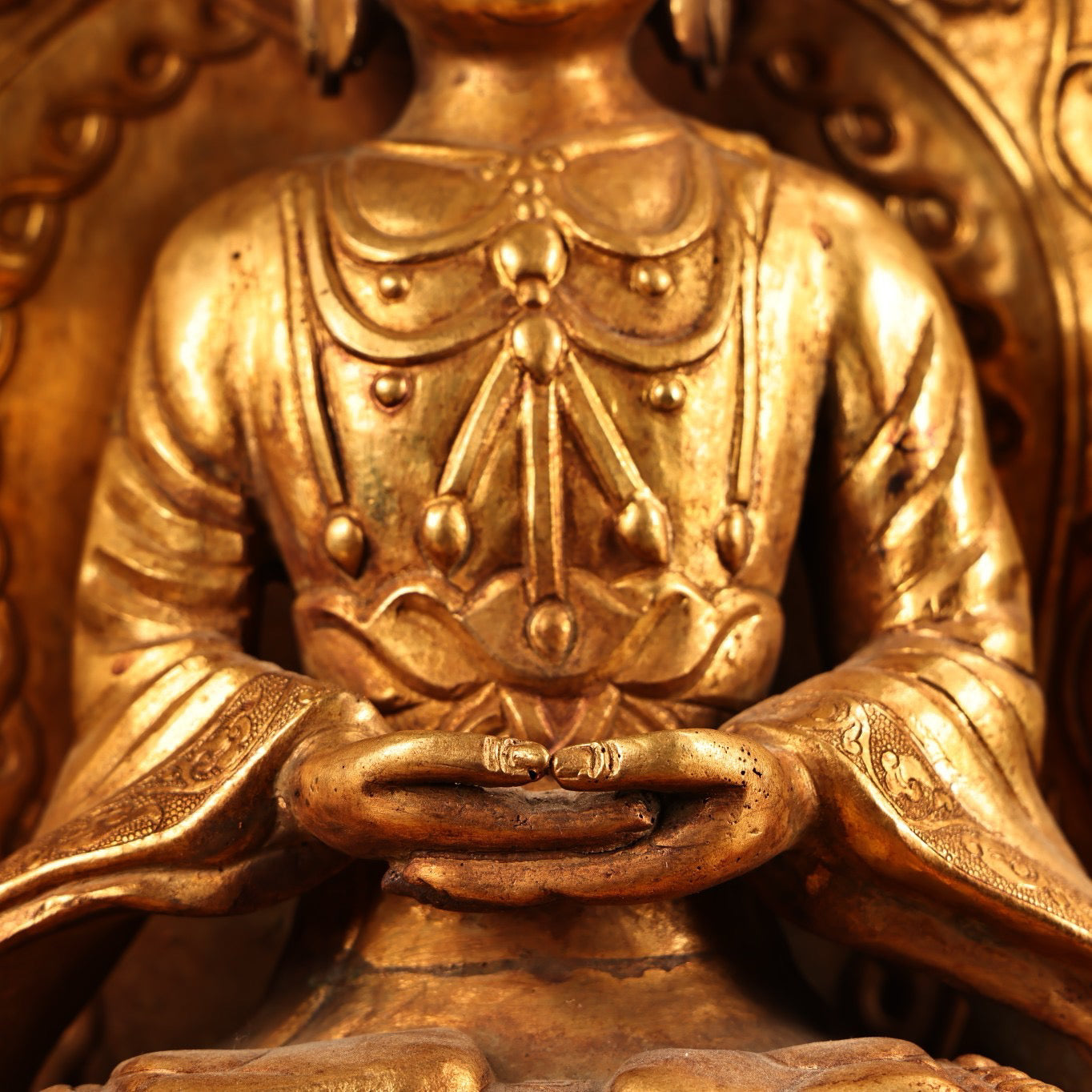 A Chinese antique pure copper high relief carved with gilded immeasurable longevity Buddha