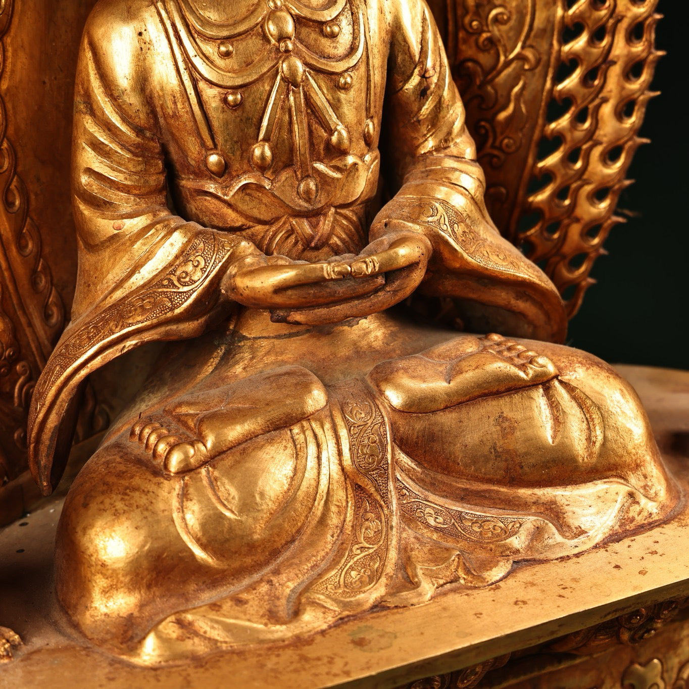 A Chinese antique pure copper high relief carved with gilded immeasurable longevity Buddha