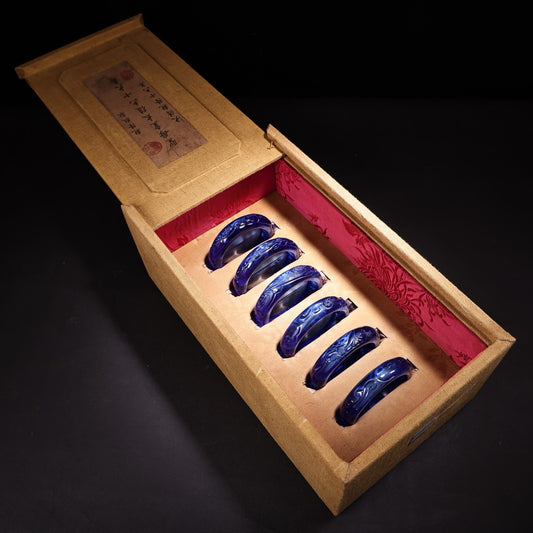 A box of Chinese antique high relief sapphire bracelets