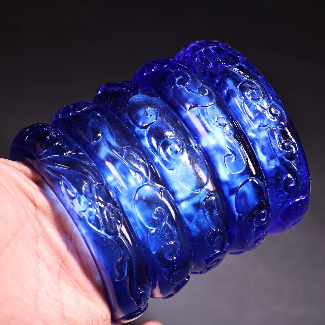 A box of Chinese antique high relief sapphire bracelets