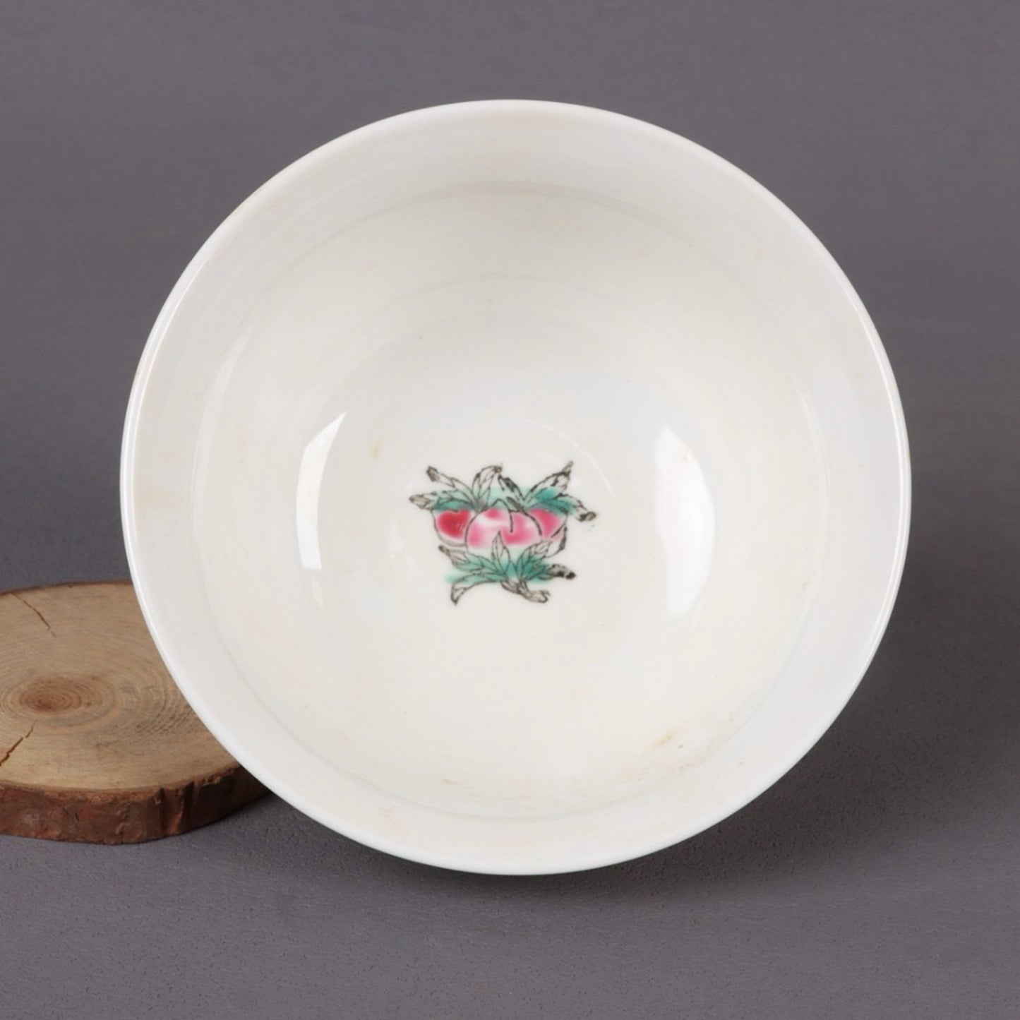 A pair of pink longevity patterned bowls