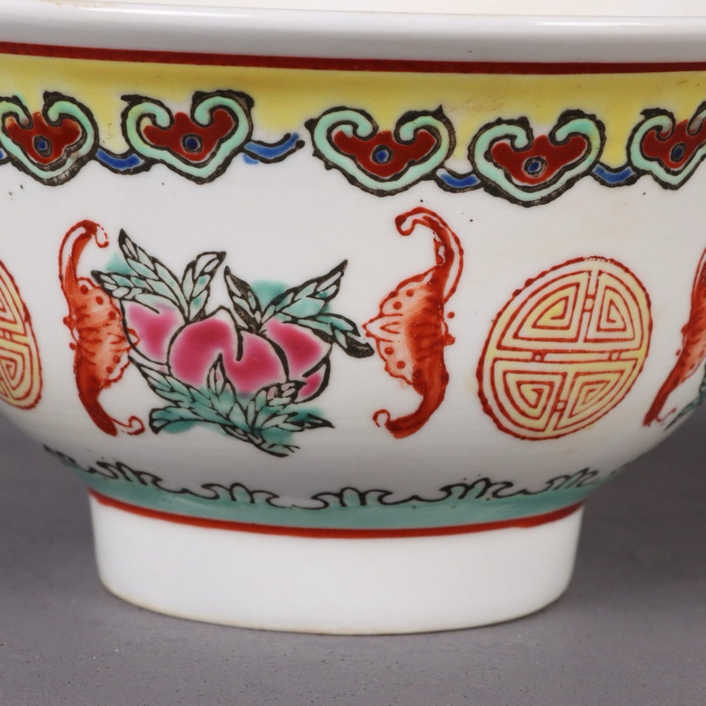 A pair of pink longevity patterned bowls