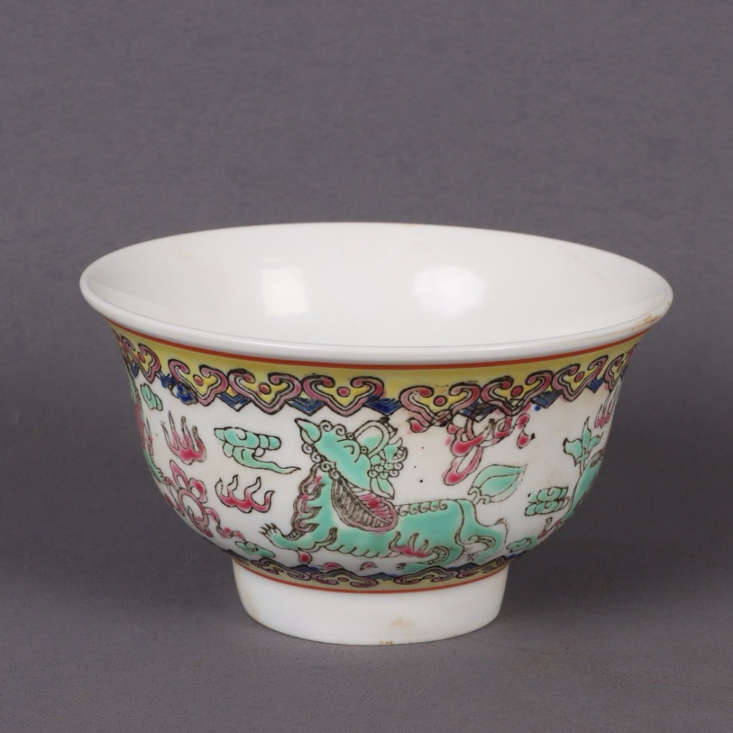 A pair of pink longevity patterned bowls