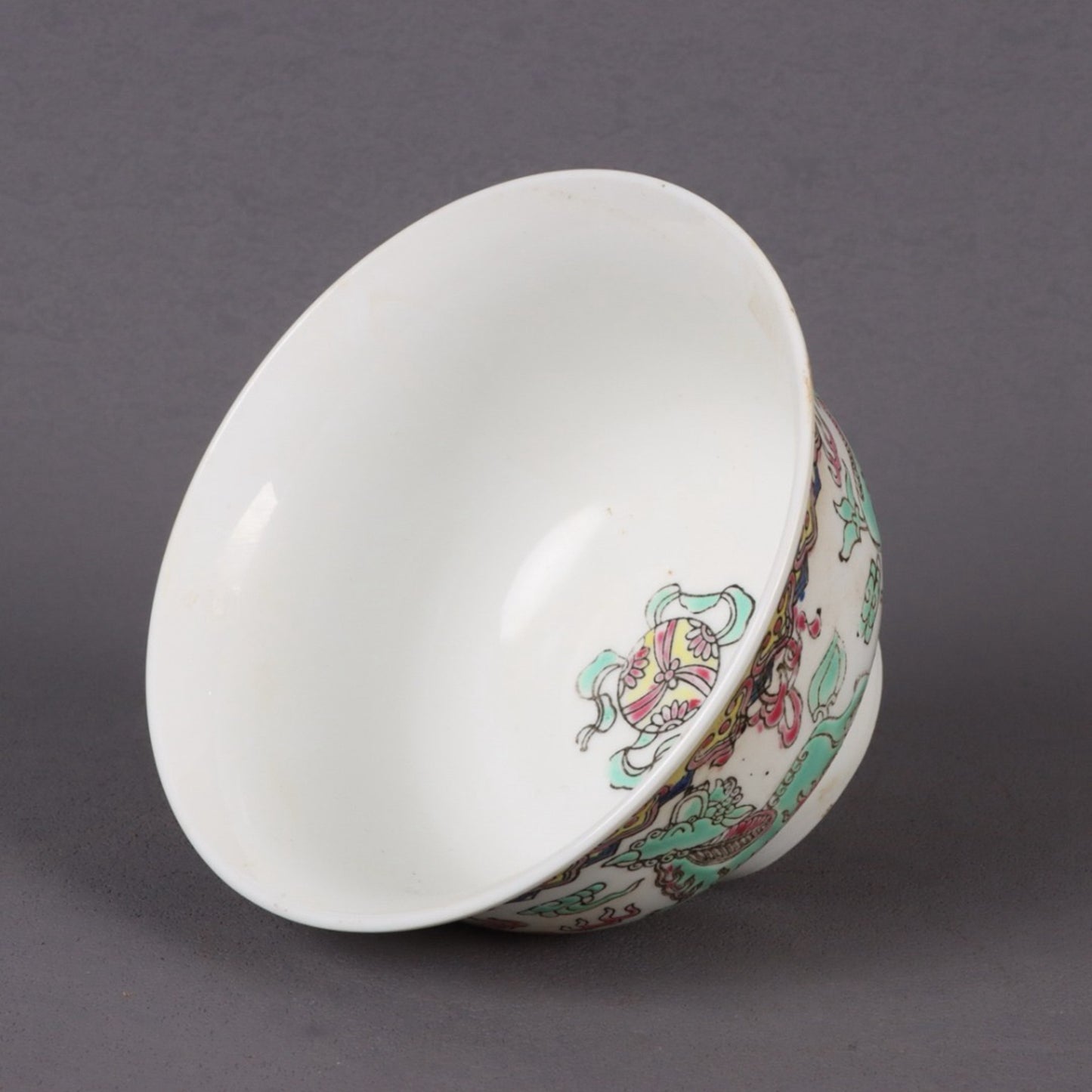 A pair of pink longevity patterned bowls