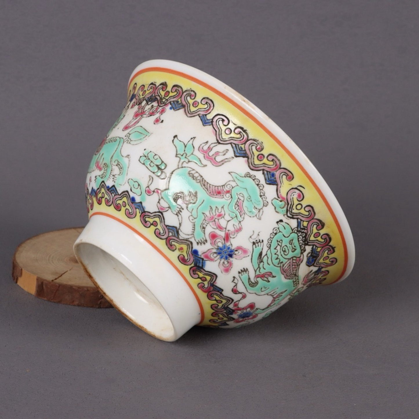 A pair of pink longevity patterned bowls