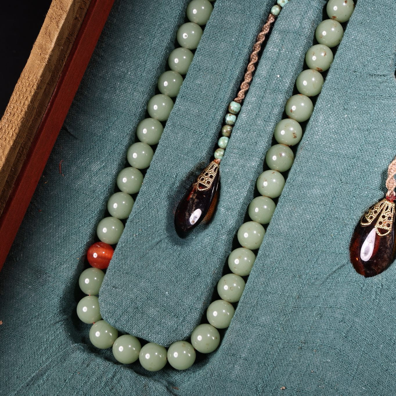 A box of Chinese antique court beads
