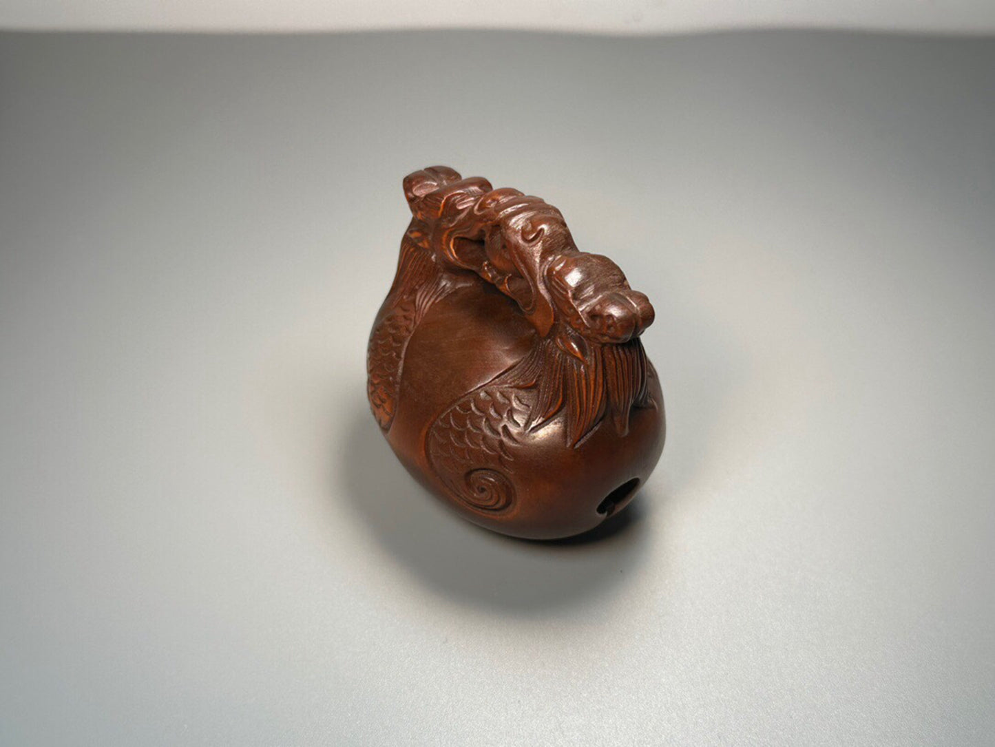 Chinese antique boxwood carving with double dragons playing with pearls and wooden fish