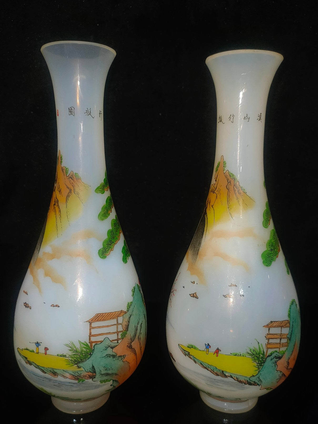A pair of glass vases