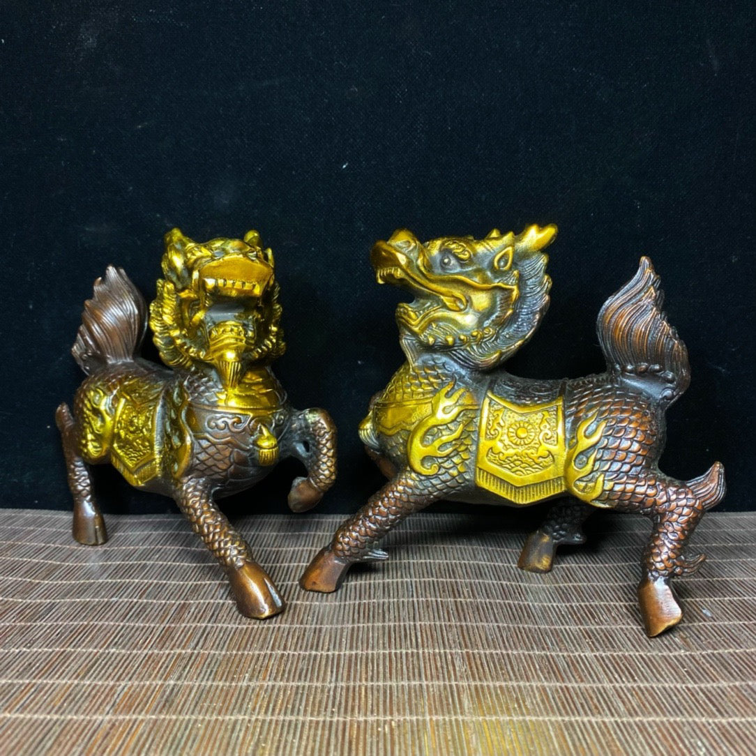 A pair of pure copper gilded and exquisite qilin