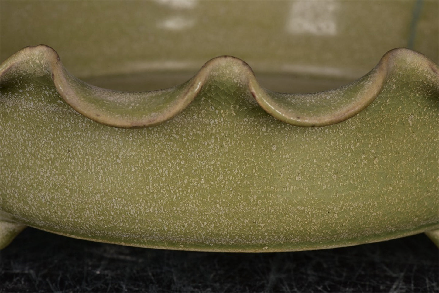 Chinese antique relief flower mouth three legged wash