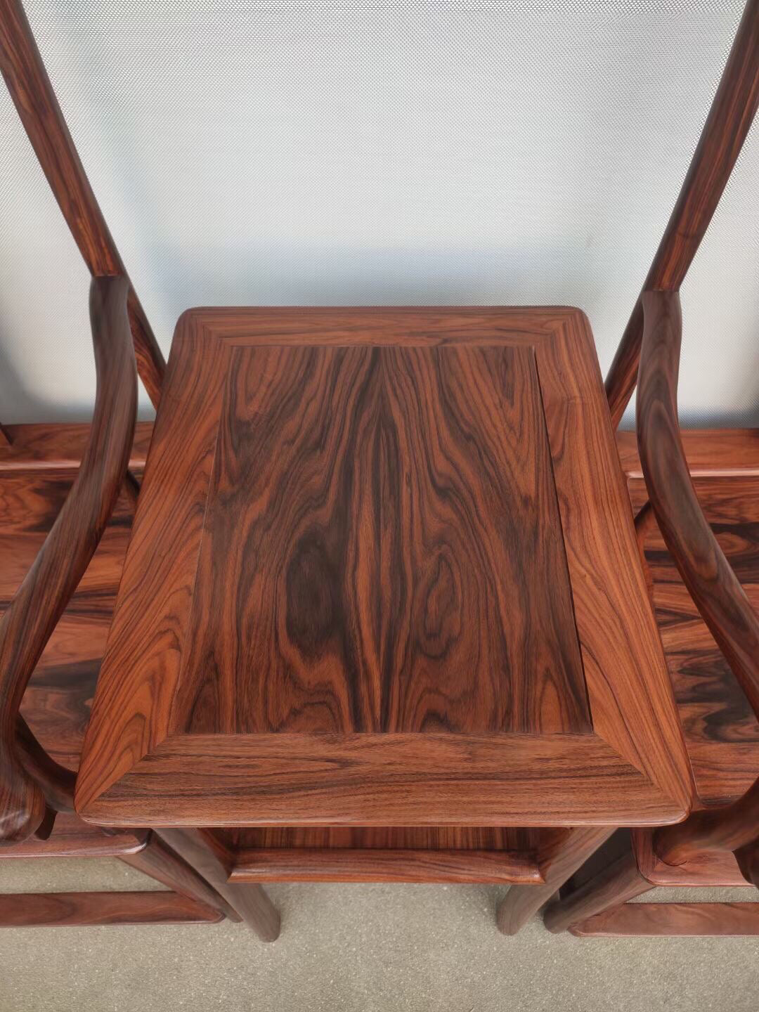 A set of Chinese antique rosewood official hat chairs