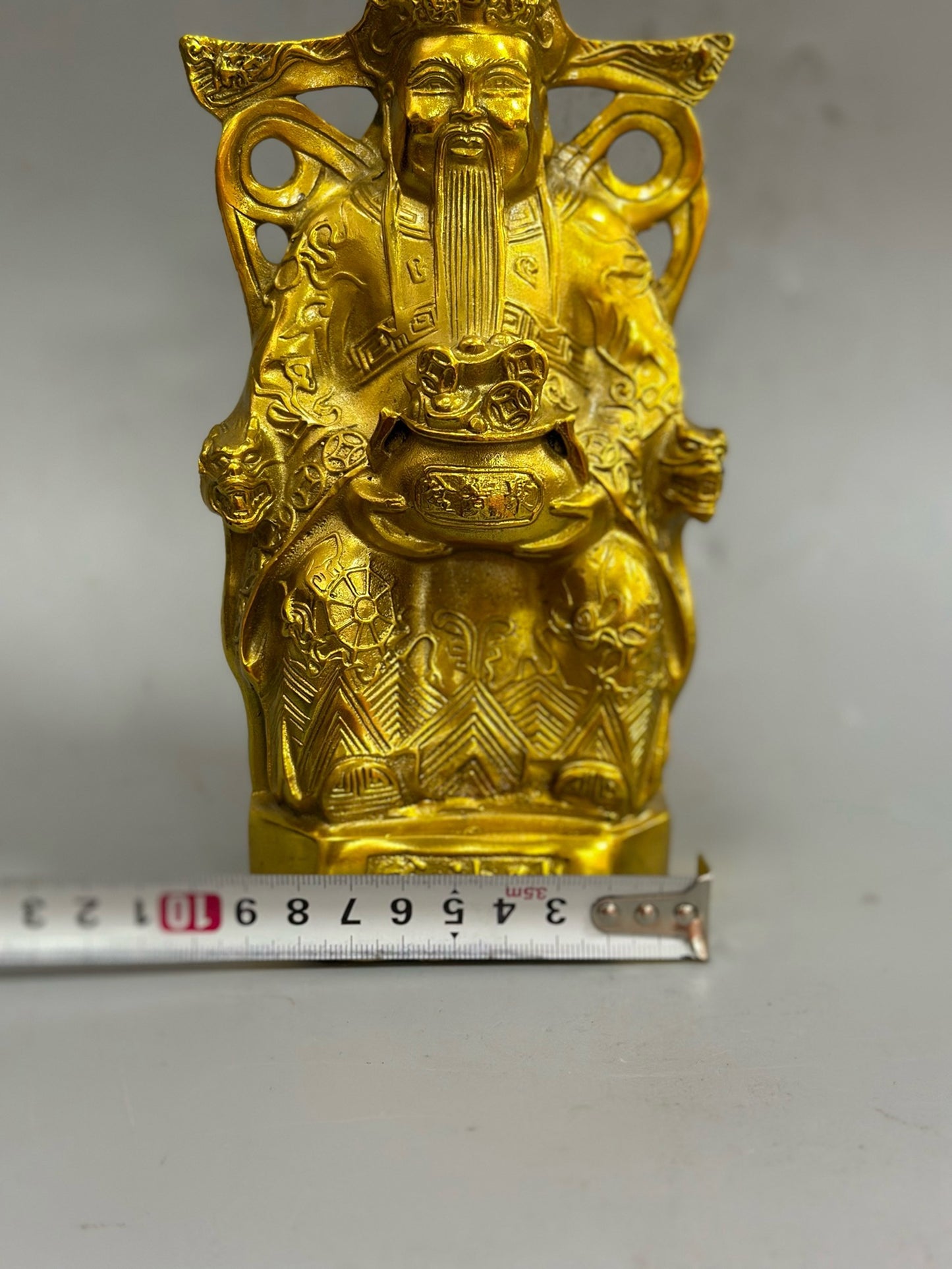Pure copper craftsmanship sitting on the God of Wealth