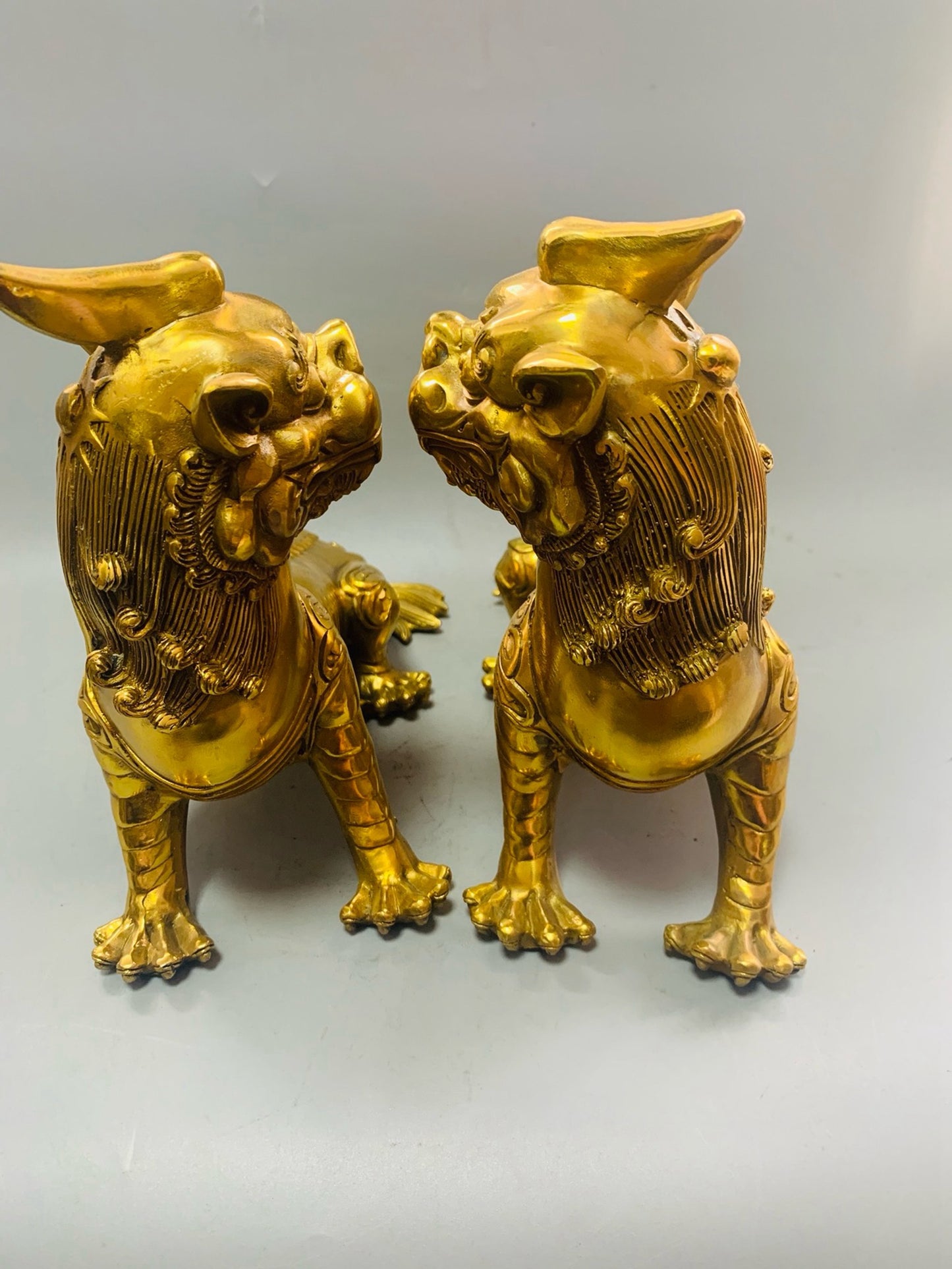 A pair of pure copper precision workers listening attentively