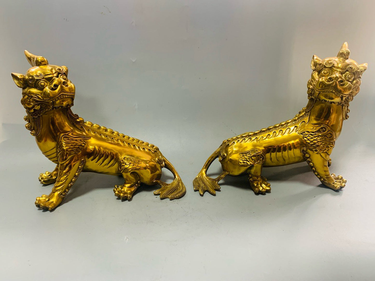 A pair of pure copper precision workers listening attentively