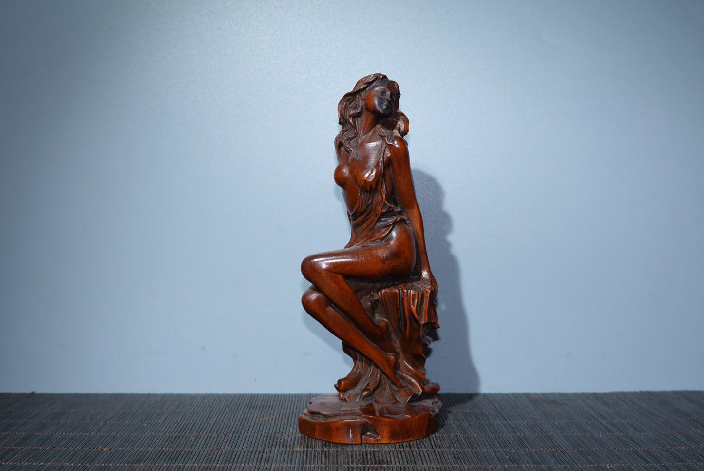 Small leaved boxwood carved female statue