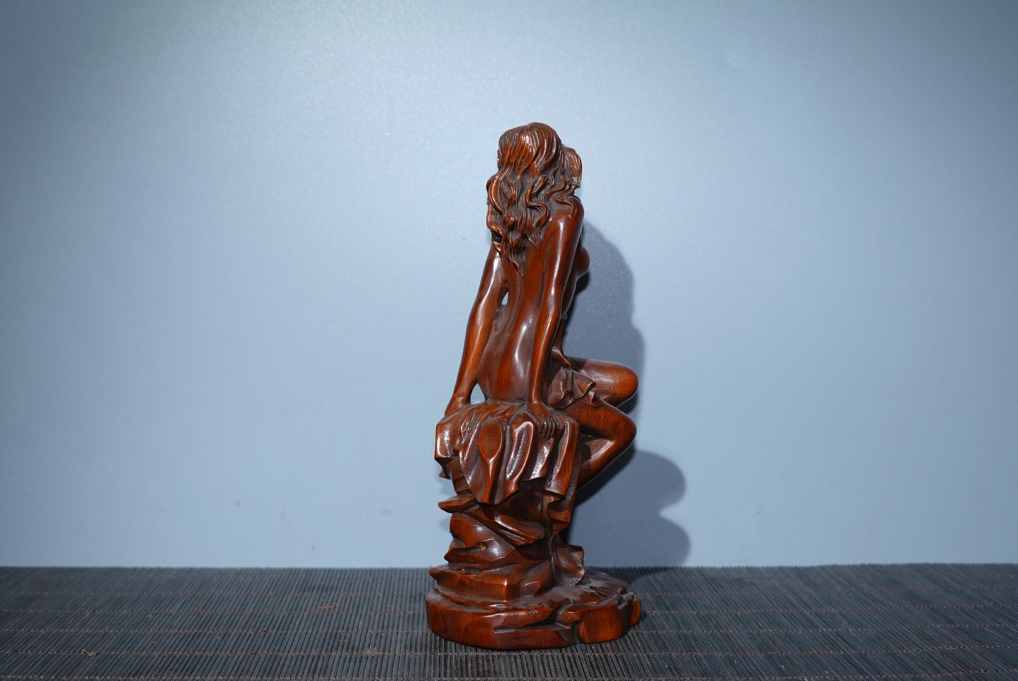 Small leaved boxwood carved female statue