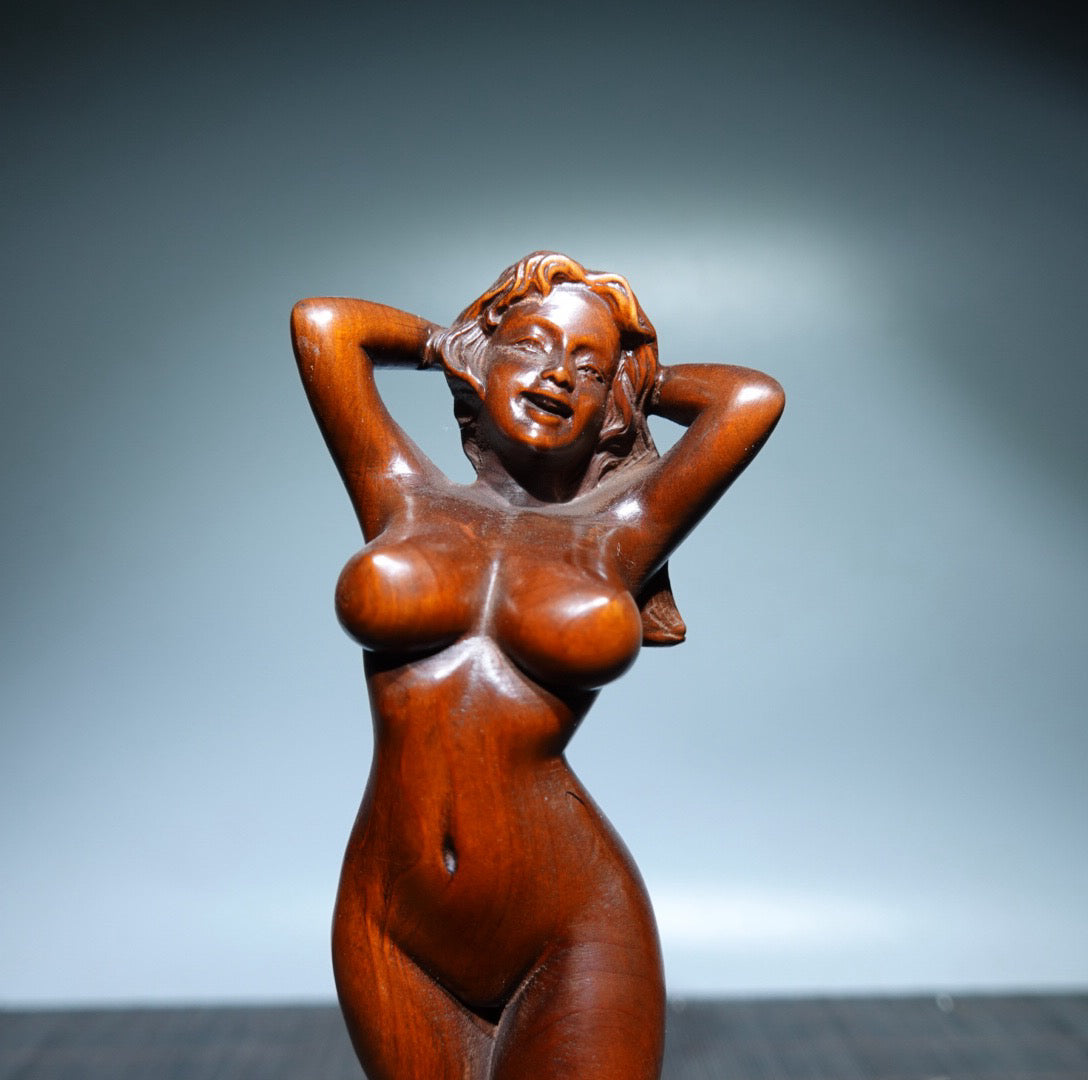 Small leaved boxwood carved female statue