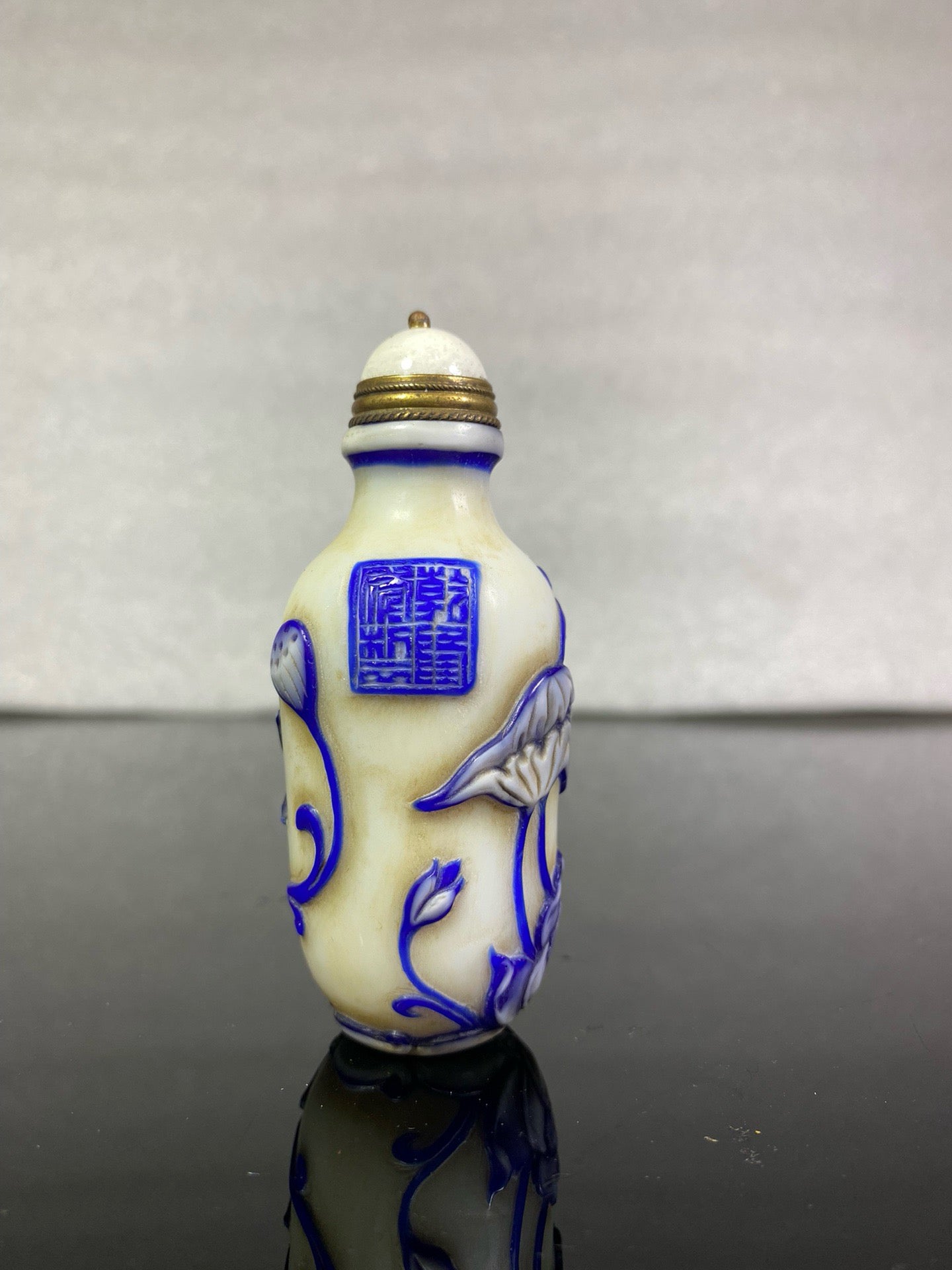 Chinese antique glass high relief carved snuff bottle