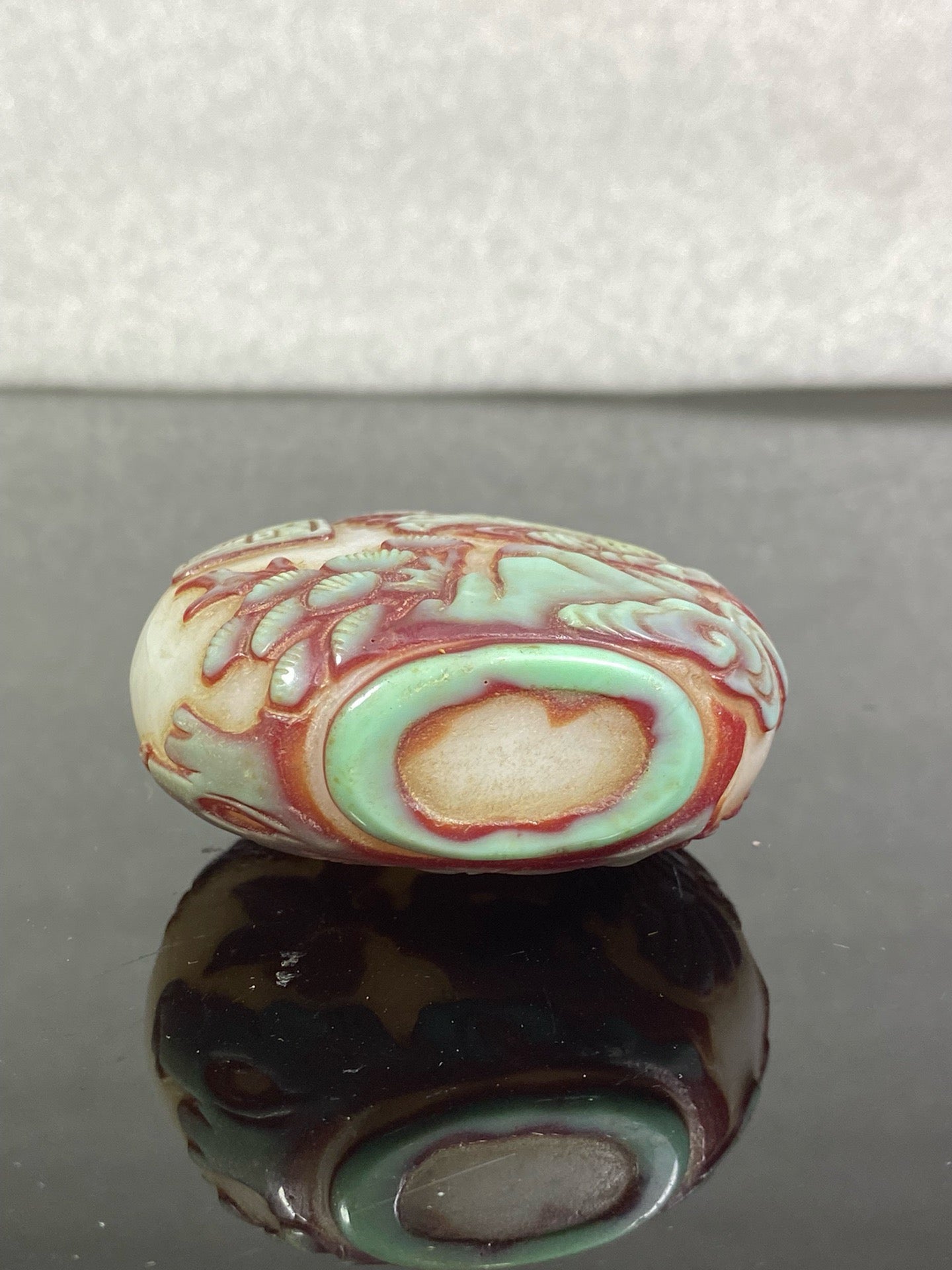 Chinese antique glass high relief carved snuff bottle