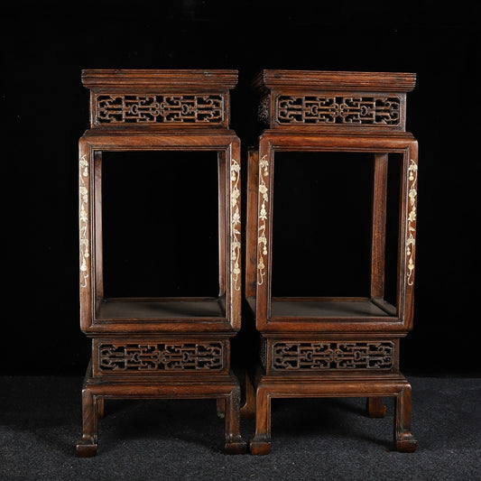 A pair of rosewood flower racks